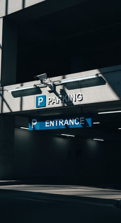 Entrance of a modern office building with blue exit signの写真素材