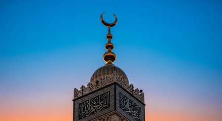 Mosque with golden domes and crescent moon at sunset.の写真素材
