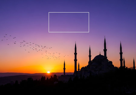 Frame for your text, photo or image with mosque silhouette at sunsetの写真素材