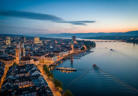 Aerial view of Limmat river and cityscape of Zurich at sunset, Switzerlandの写真素材