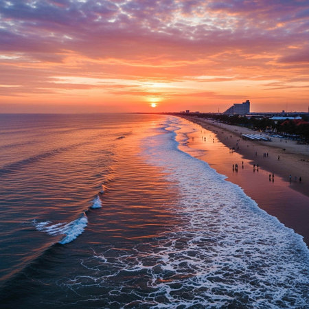 Aerial view of beautiful sunset over the sea and sandy beach.の写真素材