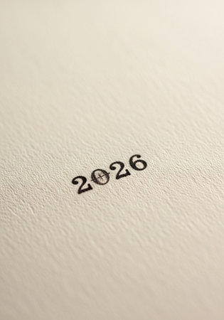 New Year's card with the inscription 2026 on a white sheet of paperの写真素材