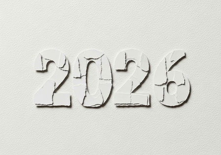 New Year's card with the number 2026 on a white paper backgroundの写真素材