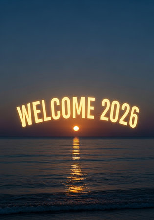 Welcome sign on the beach at sunset time. Happy new yearの写真素材
