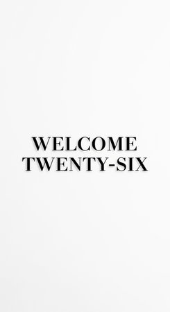 WELCOME TWENTY-SIX text on white backgroundの写真素材