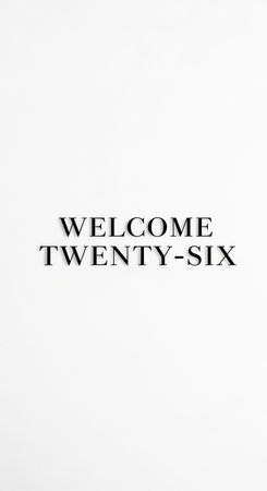 Welcome Twenty-Six text on a white paper background. Copyspace.の写真素材