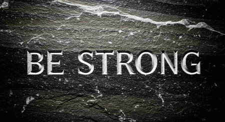 Be Strong Concept text on dark stone background. Motivational quote.の写真素材