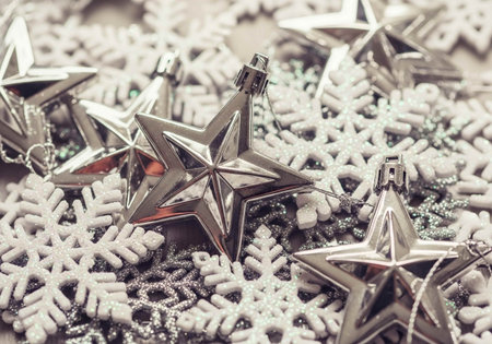 Christmas decoration with silver stars and snowflakes. Shallow dof.の写真素材
