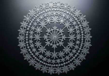 Snowflake on a black background. Christmas and New Year concept.の写真素材