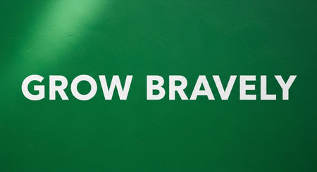 Green wall with the word GROW.の写真素材