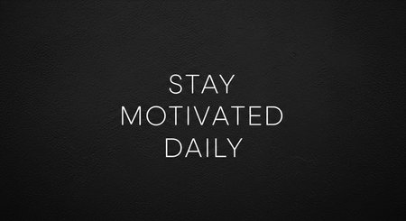 Stay Motivated Day text on black textured wall with copy spaceの写真素材