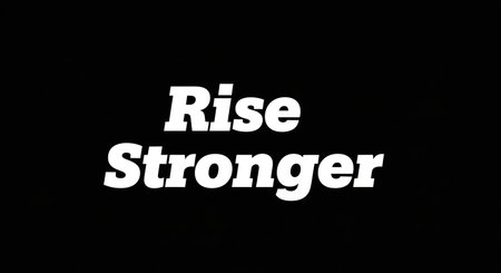 RISE STRONGER text on black background. Copyspace.の写真素材