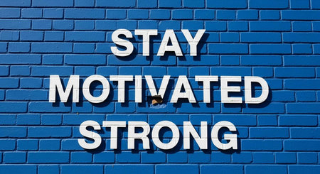 Stay Motivated Strong written on a brick wall background.の写真素材