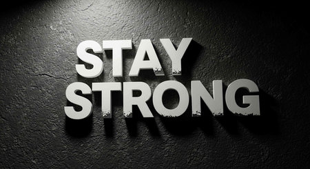 Stay Strong Concept in Grunge Dark Wall with Black Text.の写真素材