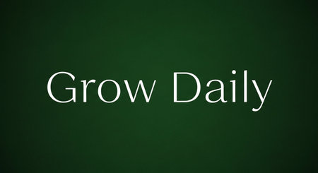Grow Daily text written with white chalk on a green blackboardの写真素材