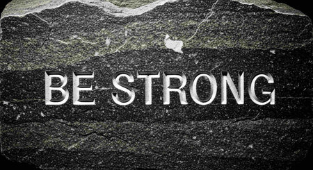 Be Strong text on stone background. Motivational and inspirational quote.の写真素材