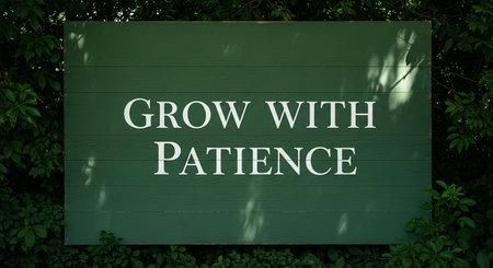 Grow With Patience sign on a green wall in the forestの写真素材