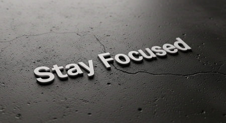 Stay focused text on black background. Motivational concept image.の写真素材