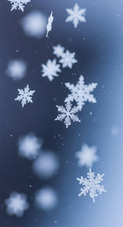 snowflakes on a blue background with bokeh effectの写真素材
