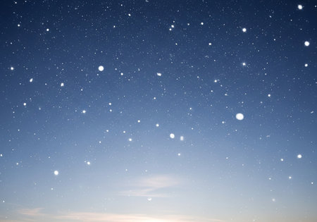background with snowflakes and starry skyの写真素材