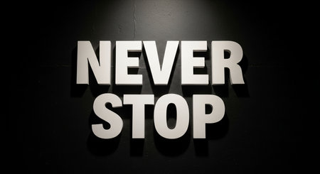 Never stop sign on black wall. 3d rendering. Illustration.の写真素材