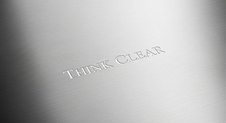The text Think Clear on a brushed metal surface in black and whiteの写真素材
