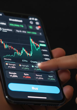 smartphone with stock market data on screen, stock market data conceptの写真素材