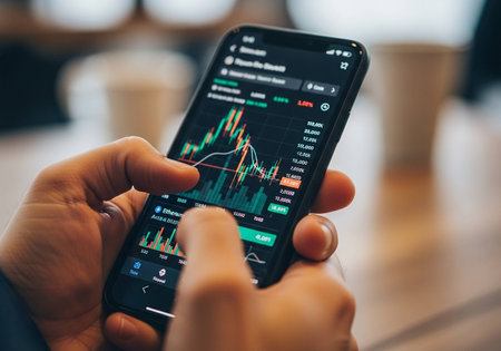 Smartphone screen displaying stock market data. Business and finance concept.