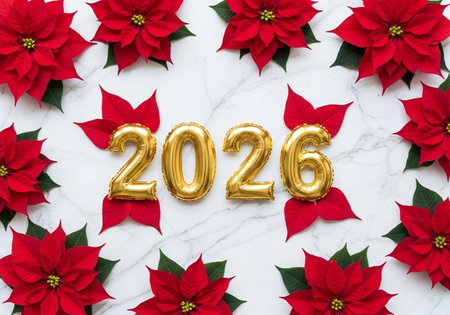 Happy new year with red poinsettia flower on white marble background