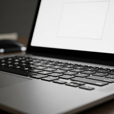Close up of a laptop computer with blank screen on the table.の写真素材