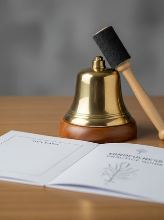 Notary public or notary public hand bell and stamp on a deskの写真素材