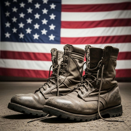 Pair of old military boots on the background of the American flagの写真素材