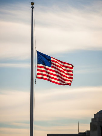 American flag waving in the wind at sunset. United States of America.の写真素材