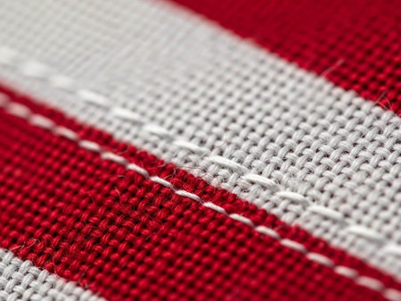 Close up of red and white fabric texture background. Macro shot.の写真素材