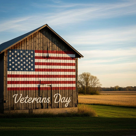American Flag on a Barn in the Countryside with a Blue Skyの写真素材