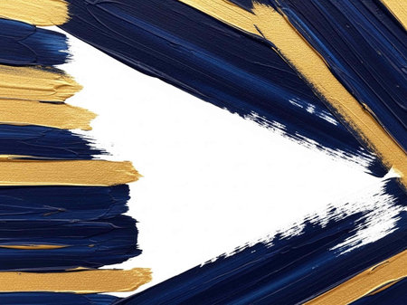 blue and gold paint brush stroke on white paper with copy space for textの写真素材