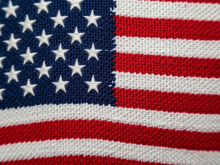 Close-up of American flag on white fabric. Macro shot.の写真素材