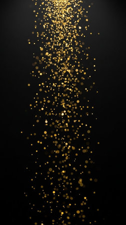 Gold glitter luxury sparkling confetti. Scattered small gold particles on black background. Bewitching festive overlay template. Captivating vector illustration.の写真素材