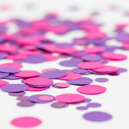 Purple hearts confetti on white background. Shallow dof.の写真素材