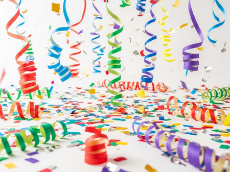 colorful confetti and streamers on white background, party conceptの写真素材