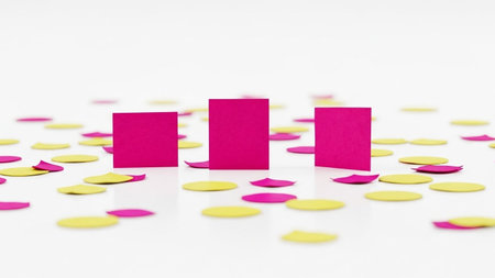 Pink and yellow paper confetti on a white background. 3d renderingの写真素材