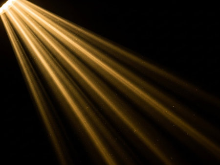 abstract scene with light rays and lens flare effect on black backgroundの写真素材