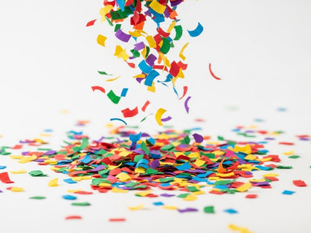 Colorful confetti on white background. Shallow dof.の写真素材