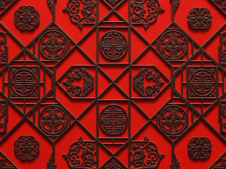 Traditional Chinese window tracery on red background, close up.