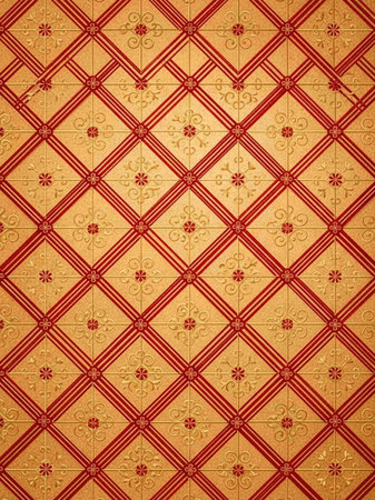 Vintage ceramic tile wall pattern background in red and yellow tone.の写真素材