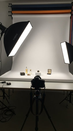 Interior of a modern photo studio with lighting equipment and accessories.の写真素材