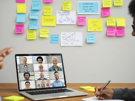 Business people using video call on laptop in creative office. Telework conference call using smart video technology to communicate colleague in professional corporate business.の写真素材