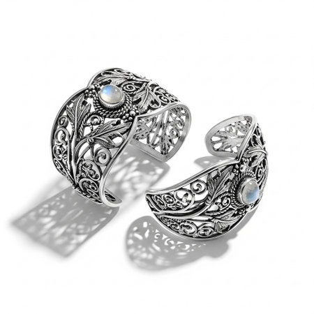 Silver bracelets with moonstones on a white background. 3D rendering