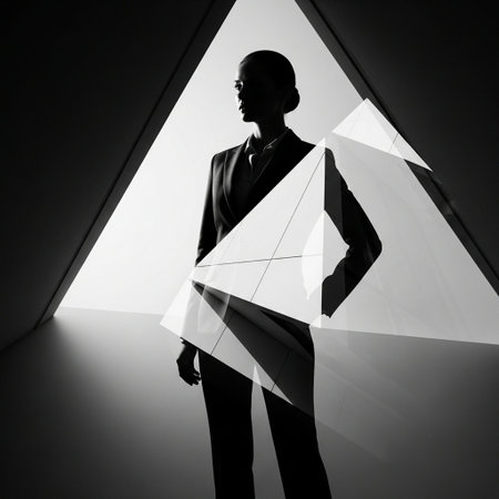 Silhouette of a businessman standing in front of a white wallの写真素材