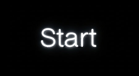 Neon sign in the shape of the word start on a black background